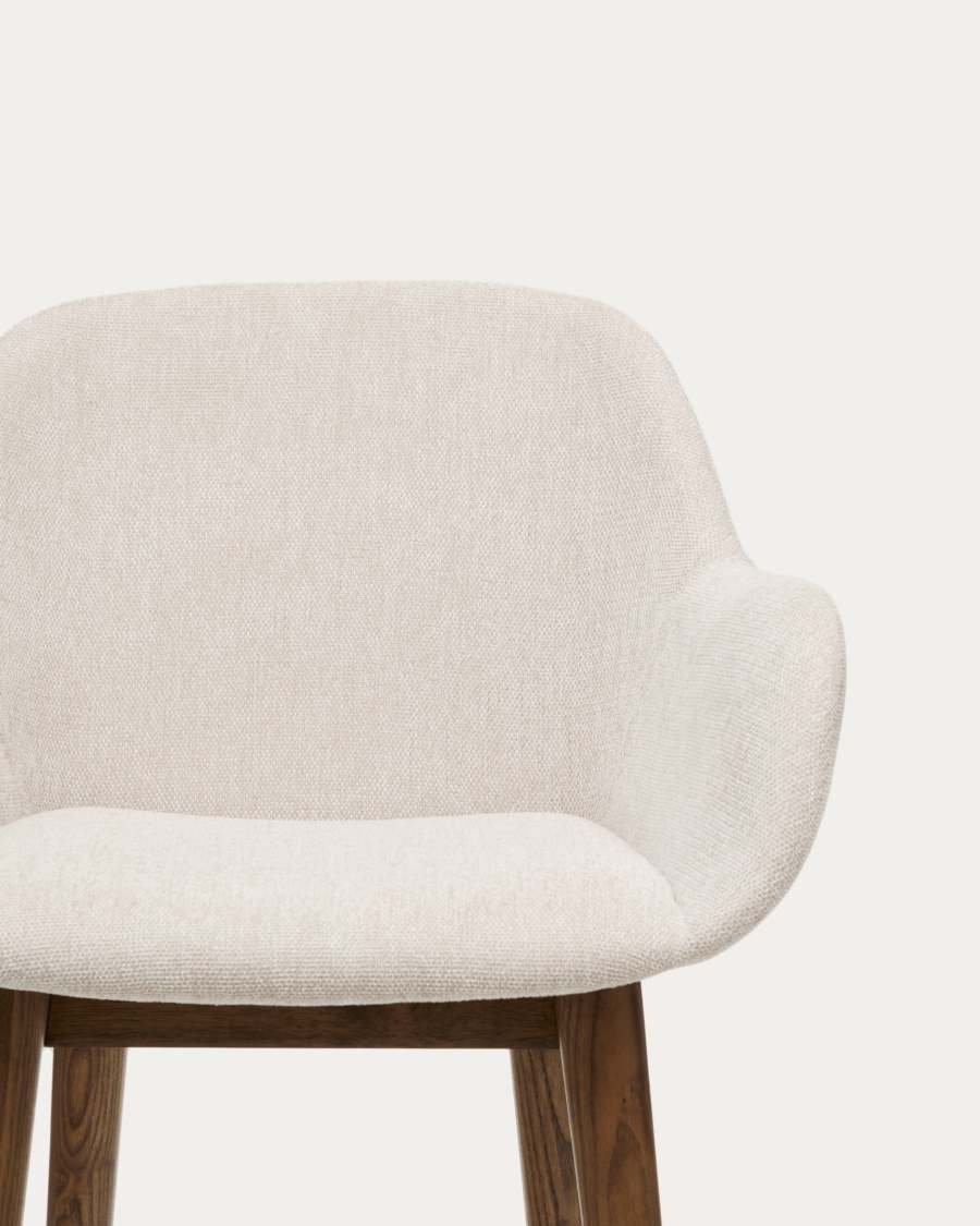 Konna stool in beige and solid ash wood legs in a dark finish, 65 cm