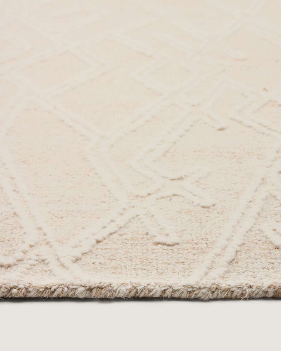 Selira beige wool rug with embroidered effect 300 x 200cm