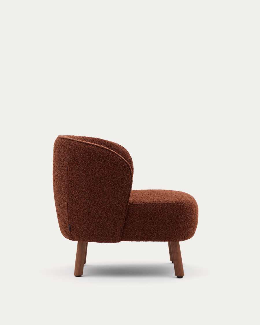 Ulit armchair in terracotta bouclé with solid ash wood legs in a walnut finish