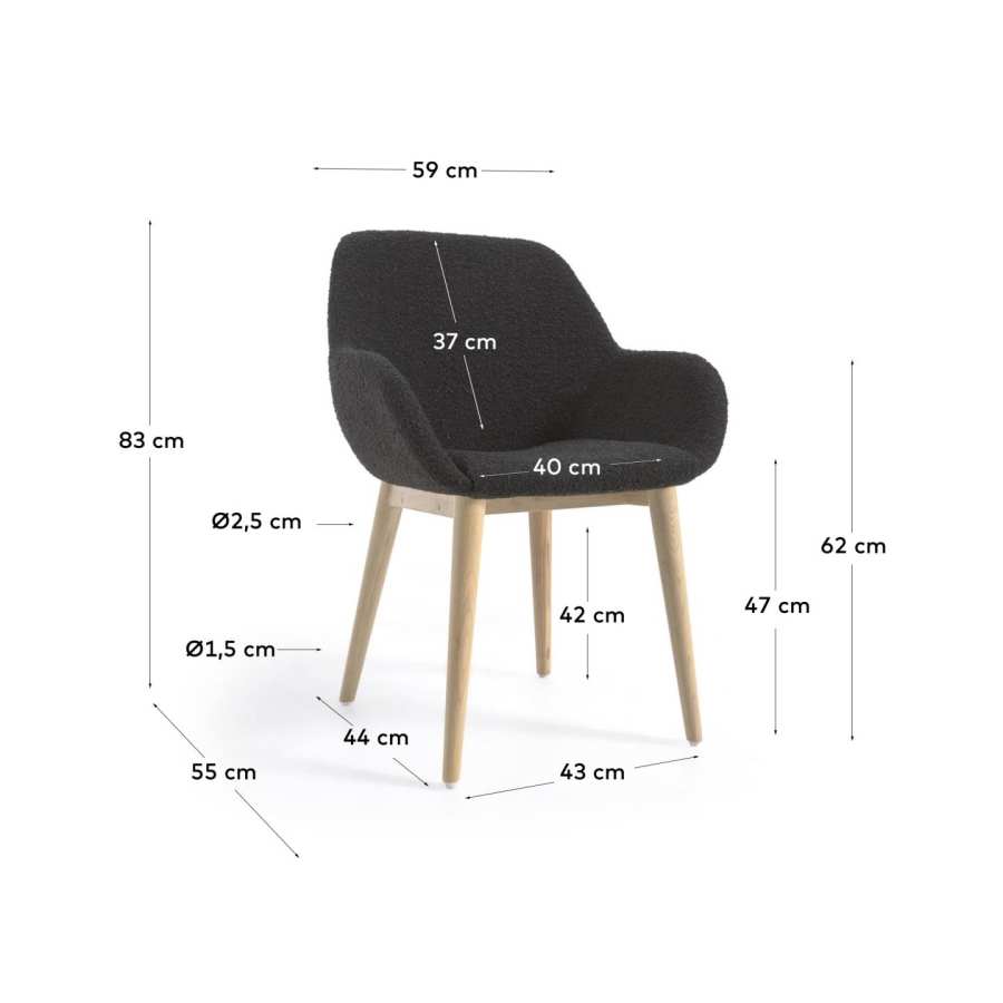 Konna chair in black bouclé with solid ash wood legs in a natural finish