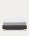 Nikos tall bed base in black with solid beech wood legs for a 180 x 200 cm mattress