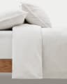 Set Yanil copripiumino e federa 100% cotone percalle con frange écru letto 90 cm