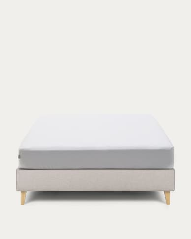Nikos tall bed base in beige with solid beech wood legs for a 140 x 190 cm mattress